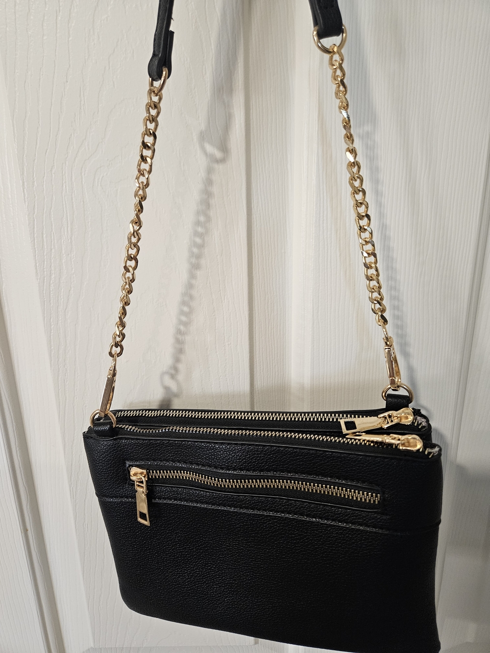 Classic Black Crossbody Bag with Gold Hardware